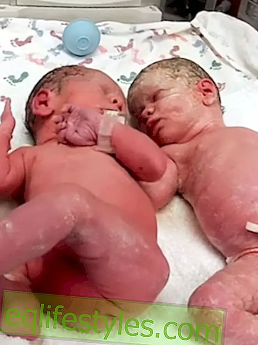 Sweet reaction: Twins see themselves outside the womb for the first time
