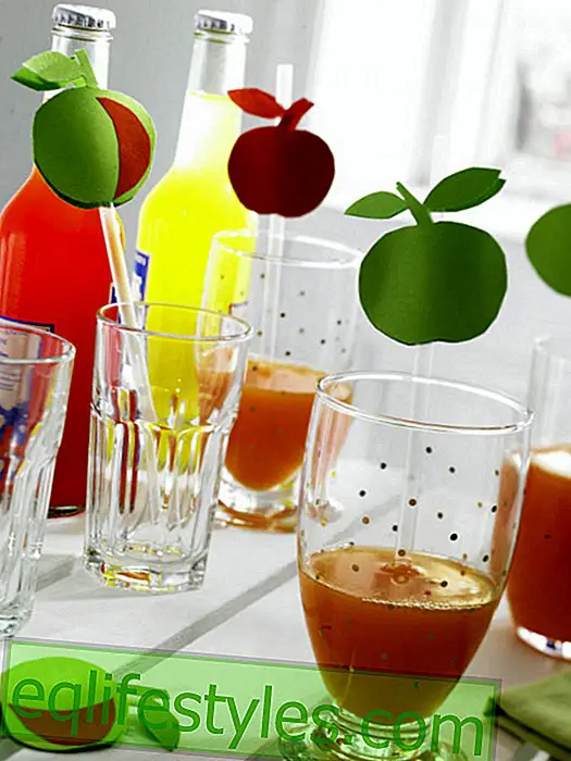Straws with apples made of construction paper