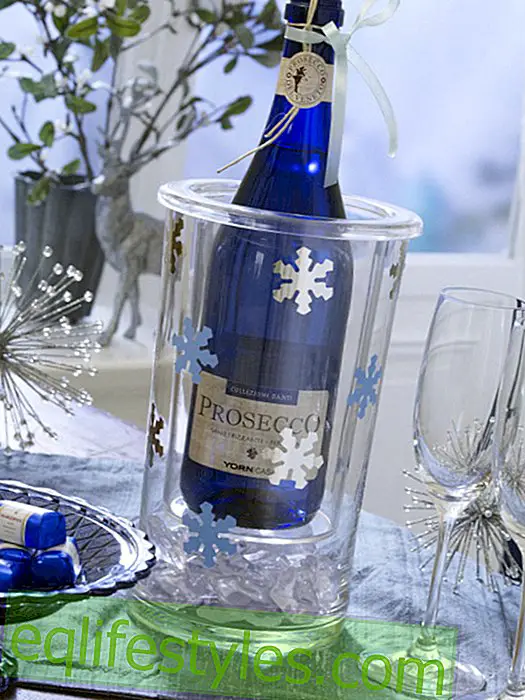 Transparent champagne cooler with ice stars