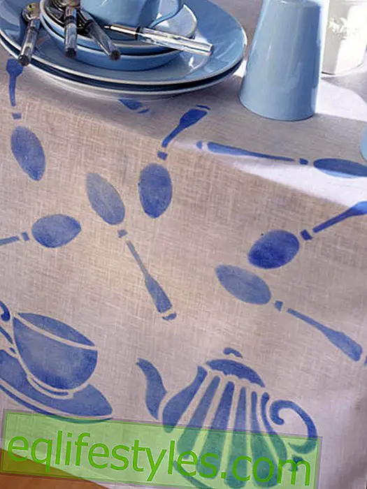 Tablecloth stamped with kitchen motifs